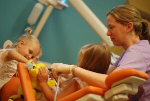 Happy Kids getting dental treatments.